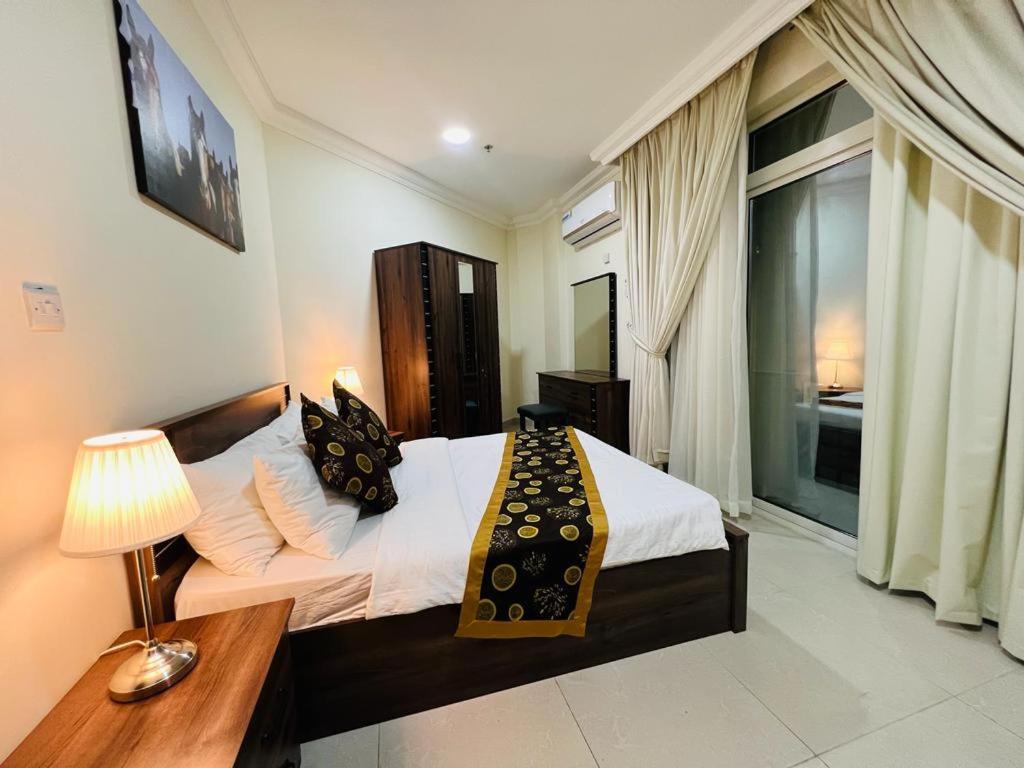 Chelsea Gardens Apartment โดฮา ภายนอก รูปภาพ